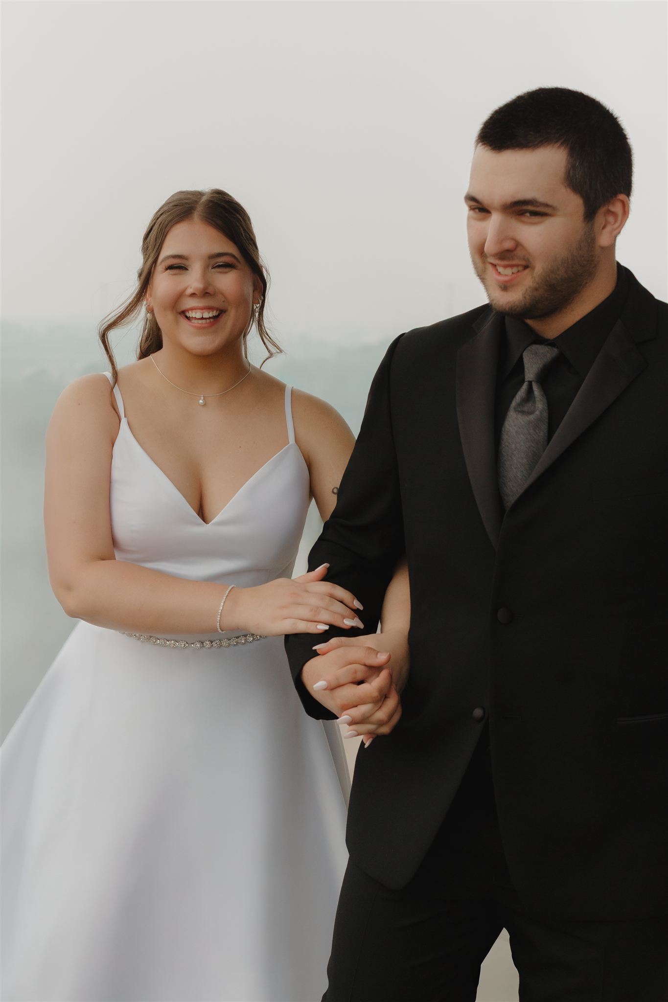 Bride and groom walking together after their wedding ceremony